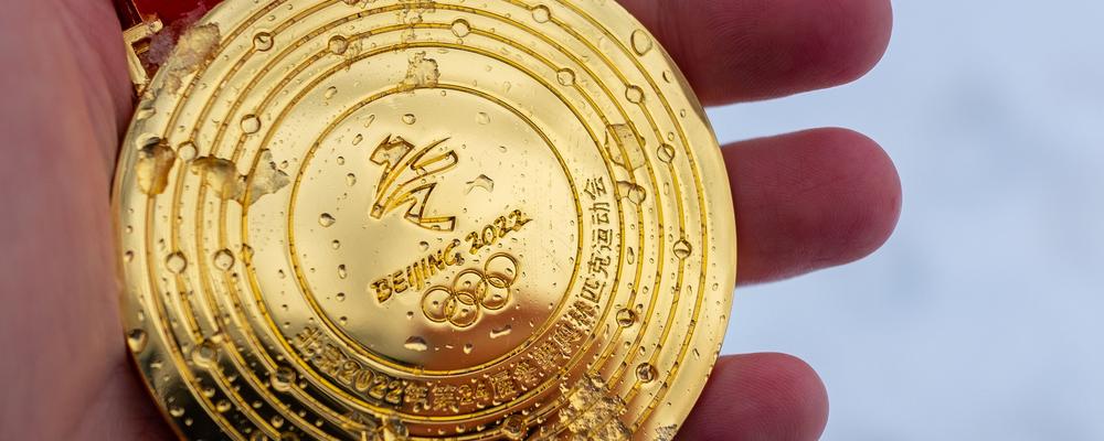 The gold medal is, in fact, a silver medal with a thin layer of gold.