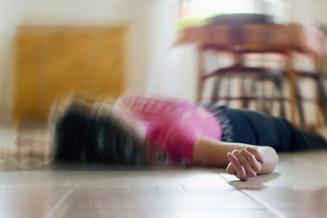 Person lying on the floor