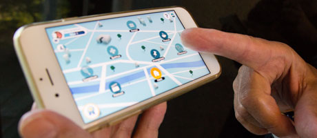 Photo of a smart phone with PCC Game app