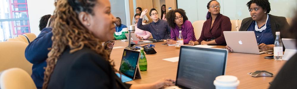 people around a conference table