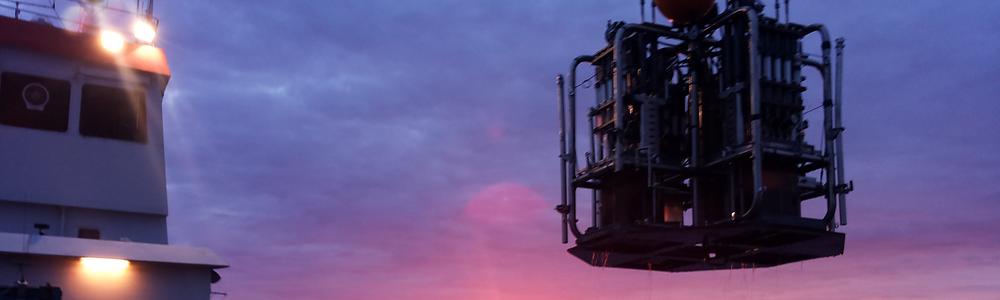 Researchers deploy a benthic lander in the Baltic Sea. 