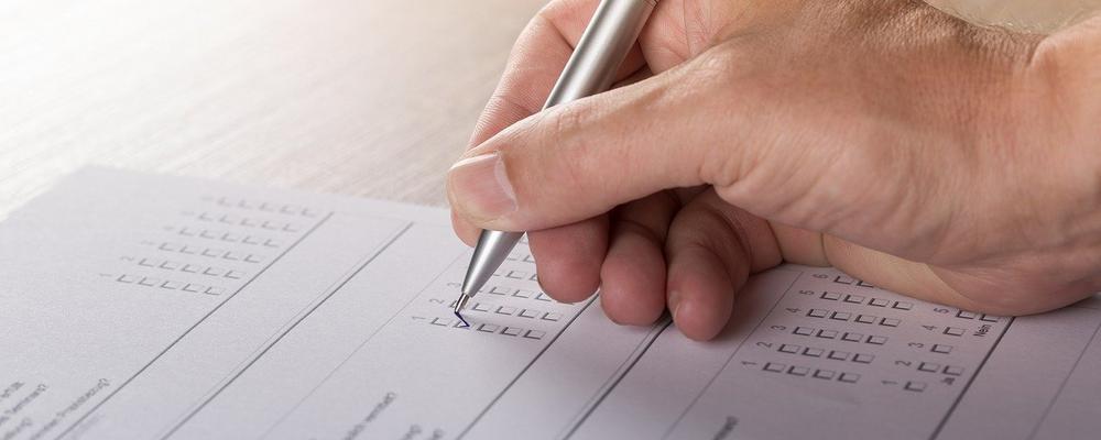 Adult man filling out screening questionnaire