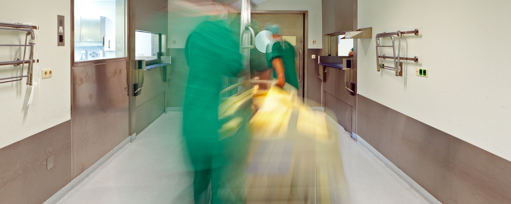 Photo of a transfer of bedbound patient in a hospital