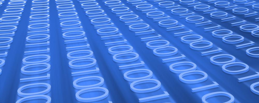 Långa rader av ettor och nollor flödar från ett hörn.