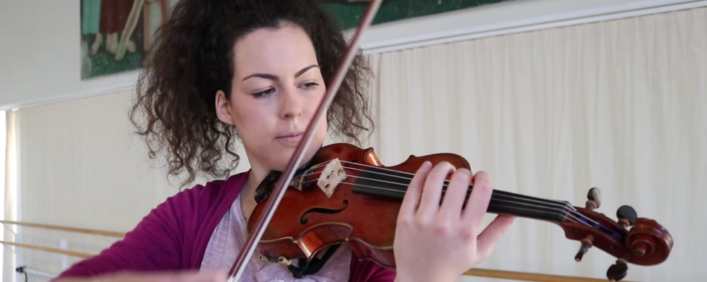 A student plays the violin