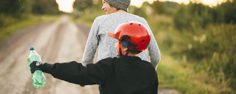 Two young persons bicycling