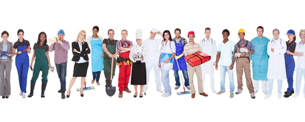 Full length of people with different occupations standing against white background 