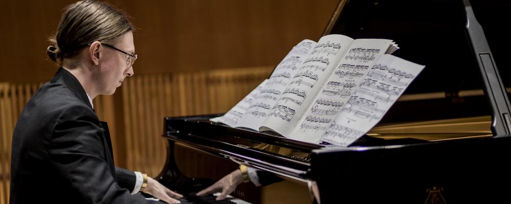 Student at a Steinway grand piano