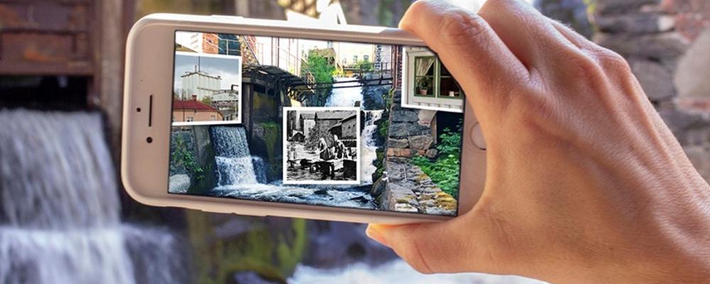 I bilden ser vi Kravnbyn genom en mobilkameralins och infällt är foton från samma plats i äldre tider..