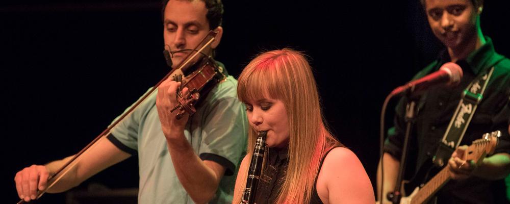 Students from The Music College on stage