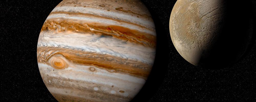 Bild på Jupiter och månen Europa.