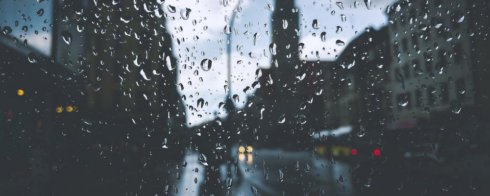 Street view through a rainy window