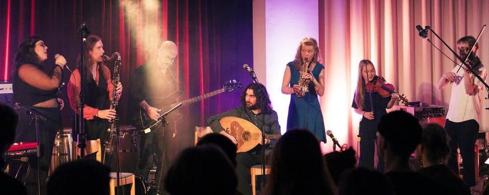 Several musicians with different instruments