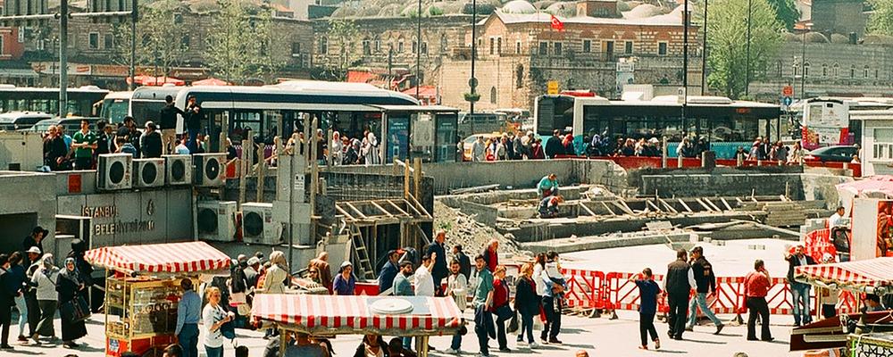 people at a market in a city in Turkey