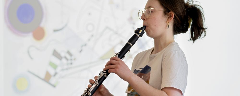 A person playing the clarinet