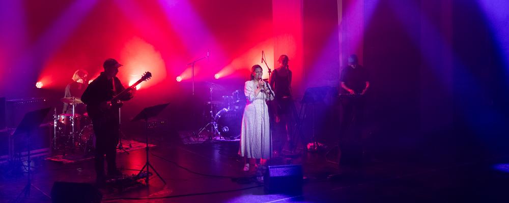 Several musicians with instruments