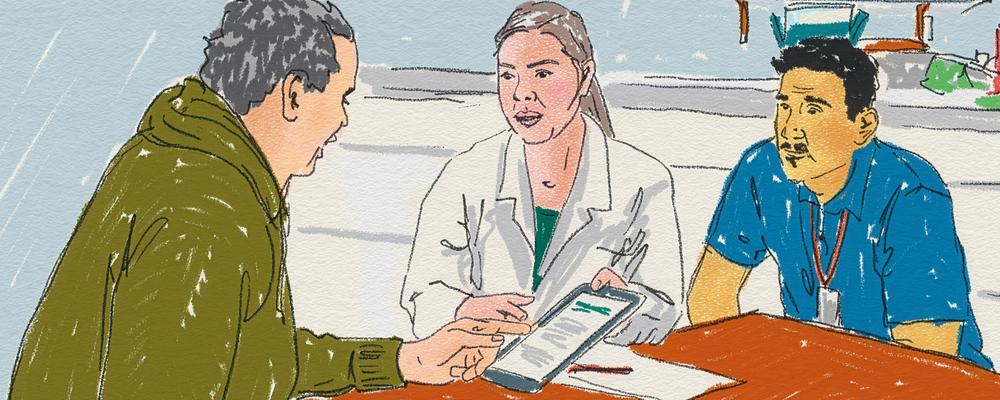 Bilden visar en manlig patient i möte med en läkare och en sjuksköterska på ett sjukhus.