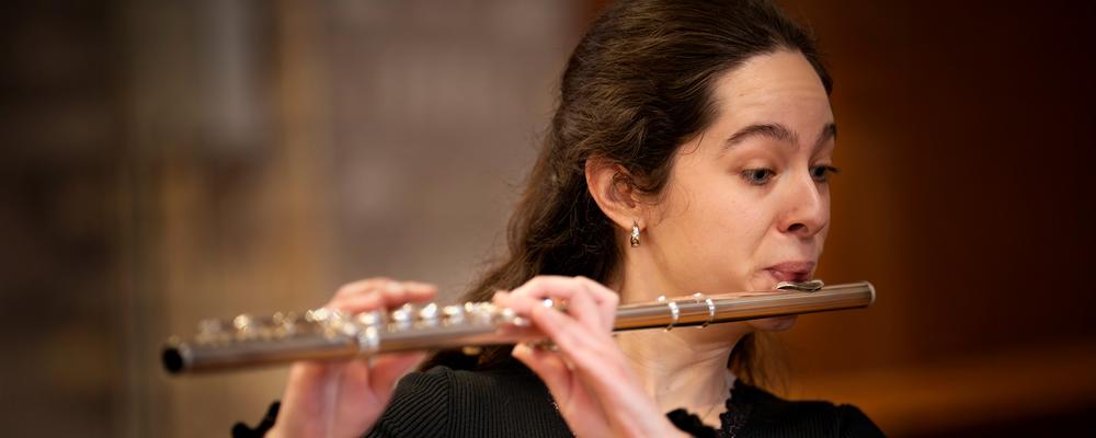 A person playing the flute