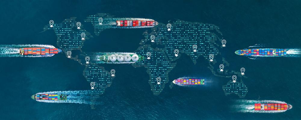 Cargo ships sailing on a world map
