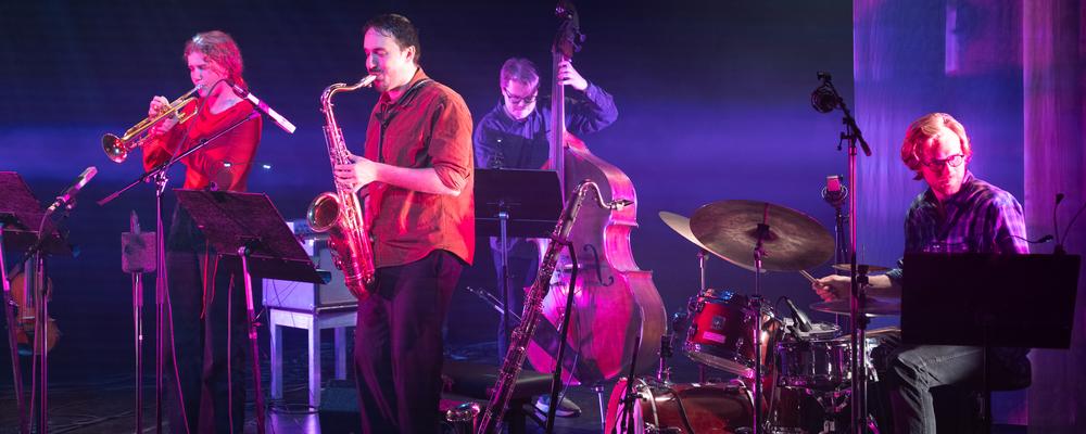 Several musicians with instruments
