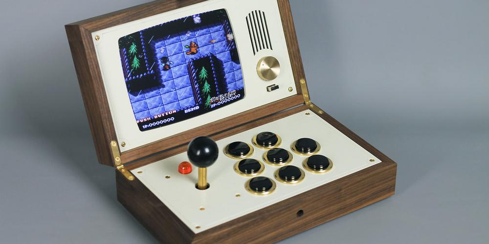 The small game console R-Kaid-R with woodwork around.
