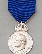  The picture shows H.M. The king's medal in the 8th size in high blue ribbon. The band that Gunnar C Hansson and Deliang Chen ar