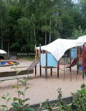 Preschool yard lacking tree shade. 