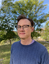 Porträttbild på Tom Blackburn.