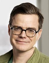 Porträtt bild Axel Wolf.