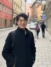 Porträtt på forskaren Xiaoye Yang. 