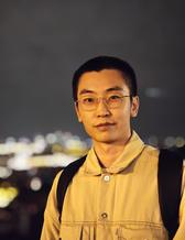 portrait photo of a man outside