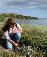Researcher looking at flora