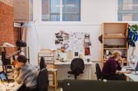 Students by their desks.