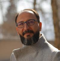 Portrait of Omid Oudbashi, photo.