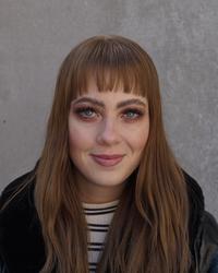 Porträtt av doktorand Maggie Kastlund.