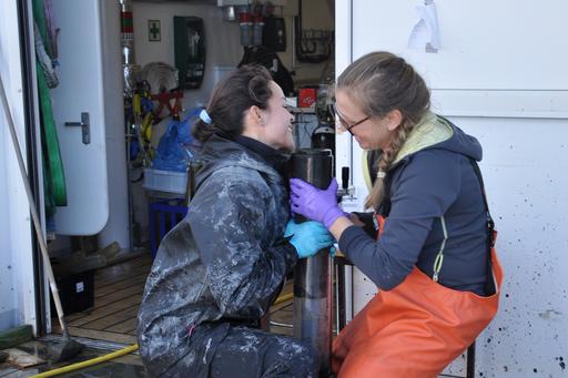 Irina on deck with dirty sediment core