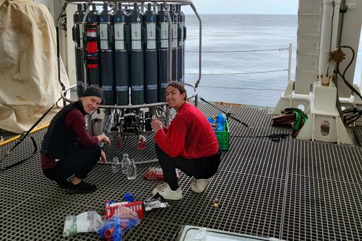 two researchers with CTD sampling instruments