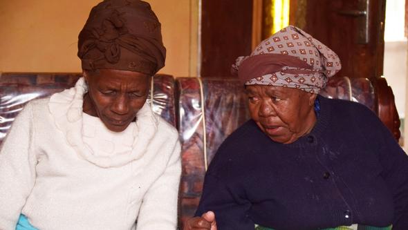 Dialog mellan två kvinnor i Sydafrika