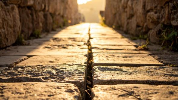 Old pavement with a gap in it