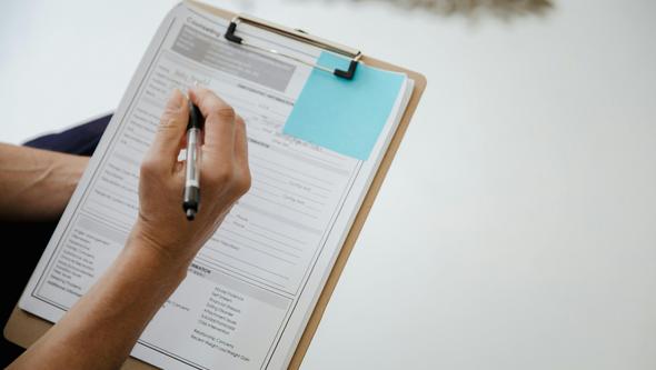 Person filling out screening questionnaire