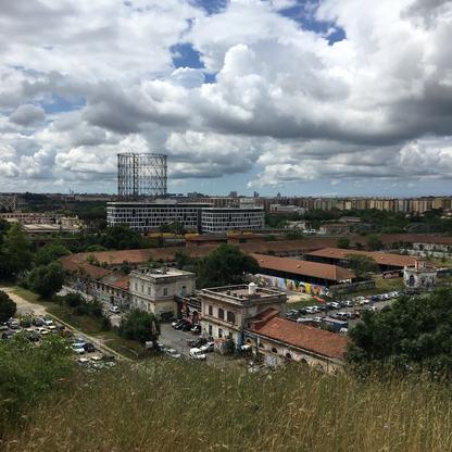 View of the old slaughterhouse quarters of Mattatoio in Testaccio overlooking Ostiense, Rome. 2019.